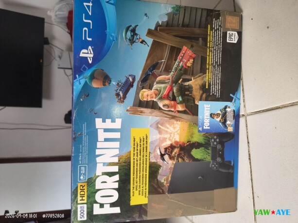 comme-neuf-playstation-4-slim-avec-manette-5-jeux-inclus-super-offre-sur-yawaaye-big-1