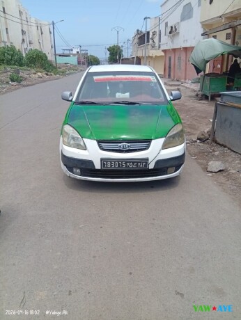 kia-2008-taxi-en-excellent-etat-pret-a-rouler-sur-yawaaye-big-1