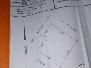 terrain-de-175m2-avec-extension-et-titre-foncier-a-vendre-a-gra-opportunite-a-ne-pas-manquer