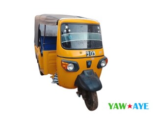 tricycle-jaune-3-places-avec-toit-bache-parfait-etat-a-saisir-sur-yawaaye