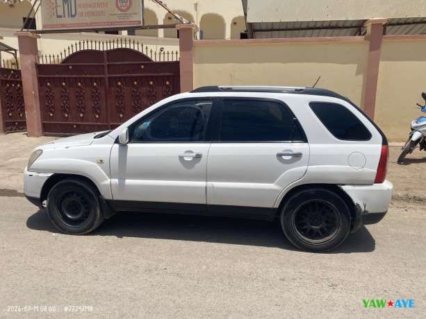 kia-sportage-en-bon-etat-carrosserie-propre-big-0