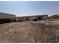 terrain-industriel-cloture-de-2826m2-avec-hangar-a-proximite-de-gabode-opportunite-a-saisir-small-0