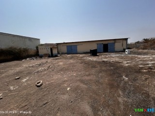 terrain-industriel-cloture-de-2826m2-avec-hangar-a-proximite-de-gabode-opportunite-a-saisir