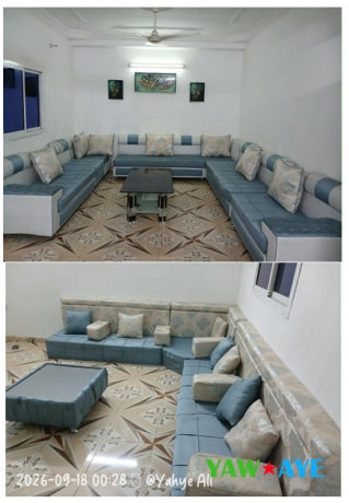 salon-complet-en-bon-etat-avec-table-et-tableaux-big-1