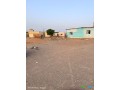 terrain-183-m2-a-vendre-emplacement-ideal-bord-de-route-pk13-sur-yawaaye-small-1