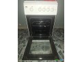 cuisiniere-limag-4-feux-avec-four-integre-etat-impeccable-blanc-epure-small-1