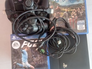 console-sony-playstation-4-avec-2-manettes-et-jeu-fifa-2024