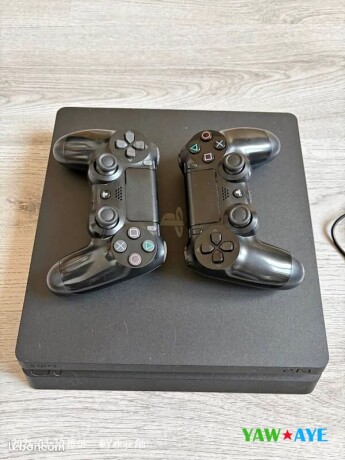 ps4-slim-bundle-2-controllers-games-like-new-yawaaye-big-0